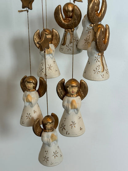 Vintage uro med engle og stjerner