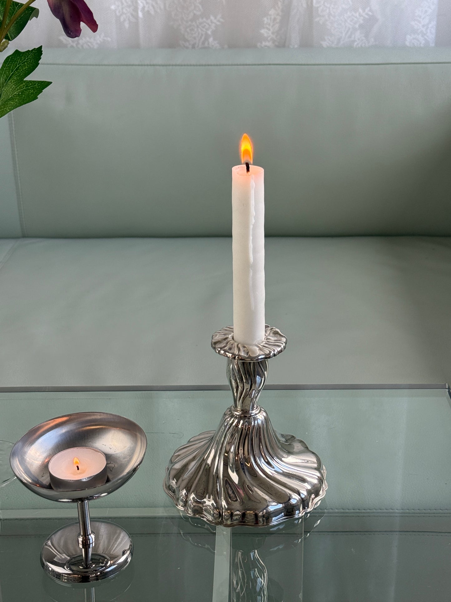 Elegant lysestage, sølvfarvet